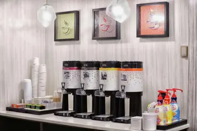 a coffee machine on a counter in a hotel room at Hampton Inn Marion in Marion
