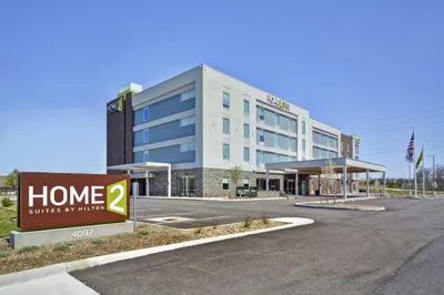 a large building with a sign in front of it at Home2 Suites by Hilton Stow Akron in Stow
