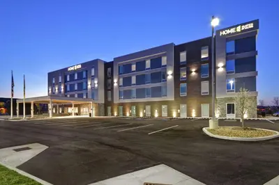 an empty parking lot in front of a hotel at Home2 Suites by Hilton Stow Akron in Stow