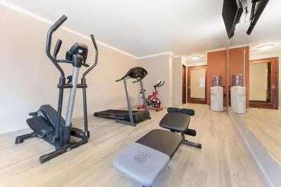 a gym with treadmills and exercise bikes in a room at Quality Inn Fairborn near Wright Patterson AFB in Fairborn
