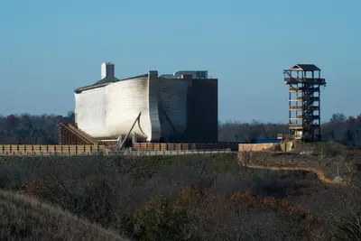 a large building on a hill with a lighthouse at Baymont by Wyndham Georgetown Lexington North in Georgetown