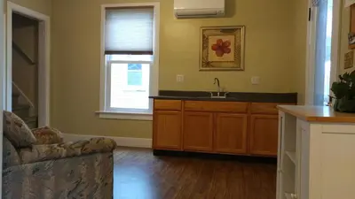 a kitchen with a sink and a counter top at Aunt Jane's Guest House in Put-in-Bay