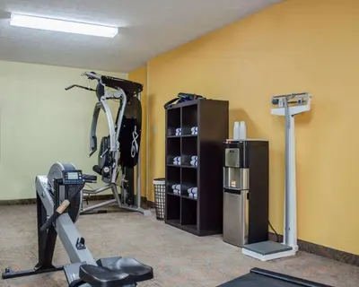 a room with a gym with a treadmill and a exercise bike at Quality Inn & Suites Medina - Akron West in Medina