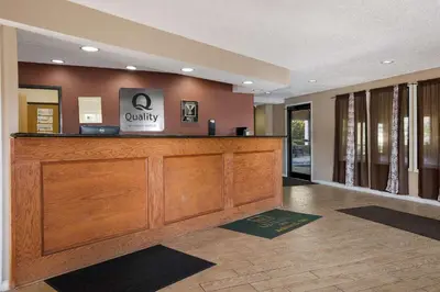a lobby with a reception desk in a building at Quality Inn Ashland East in Ashland
