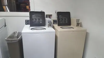 two machines sitting next to each other in a room at Travel Inn in Sharonville