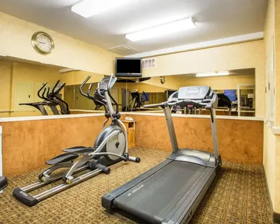 a room with a gym with a treadmill at Quality Inn & Suites North-Polaris in Worthington