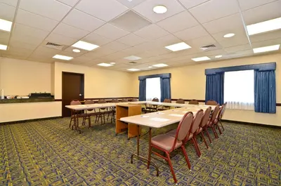 a conference room with tables and chairs in it at Best Western Gas City in Gas City
