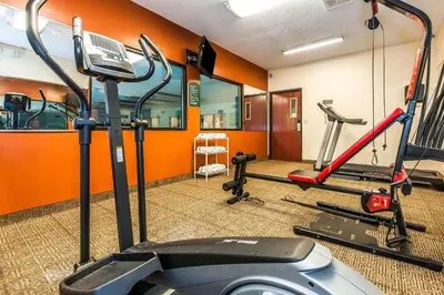 a gym with several tread machines in a room at Comfort Inn Pickerington - Columbus East in Pickerington