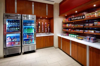 a grocery store with a large refrigerator and lots of drinks at SpringHill Suites by Marriott Columbus OSU in Columbus