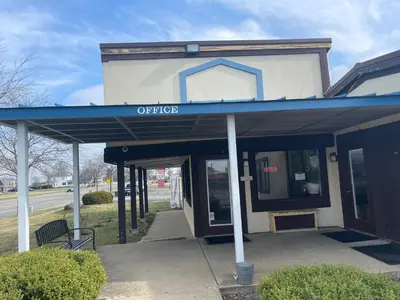 an office building with a sign that reads offsite at Blue Stone Inn in Washington Court House