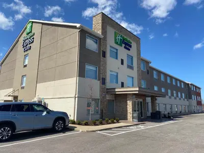 a car parked in front of a hotel at Holiday Inn Express & Suites Elyria by IHG in Elyria