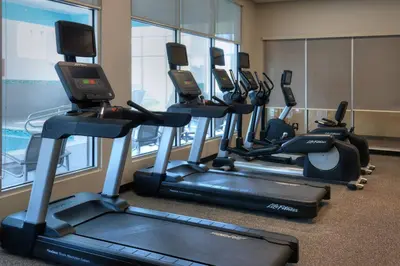 a row of treadmills in a gym at TownePlace Suites by Marriott Cleveland Solon in Solon