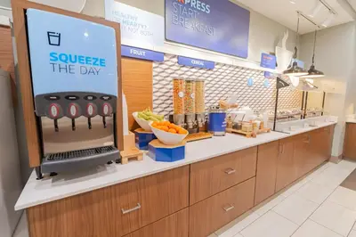 a kitchen with a counter with a juice at Holiday Inn Express & Suites - Marion by IHG in Marion