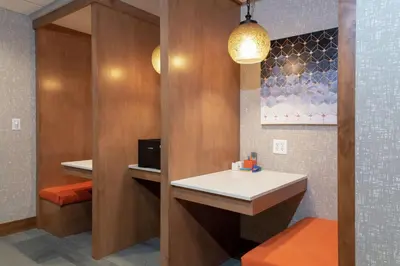 a bathroom with a sink and a mirror at Hampton Inn & Suites Xenia Dayton in Xenia