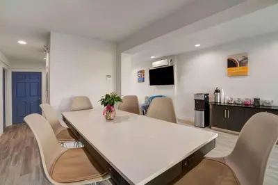 a meeting room with a table and chairs at Motel 6 Bellville, OH in Bellville