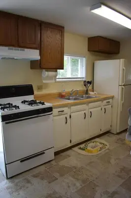 a kitchen with a white stove and a sink at Cozy 2 Bedroom House in Adrian