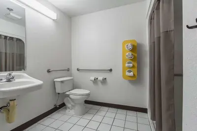 a bathroom with a toilet and a sink at Motel 6-Streetsboro, OH in Streetsboro