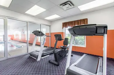 a gym with two treadmills and a treadmill at Motel 6-Streetsboro, OH in Streetsboro