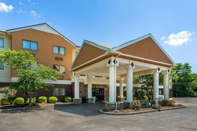 a front view of a hotel with a building at Best Western Plus Georgetown Corporate Center Hotel in Georgetown