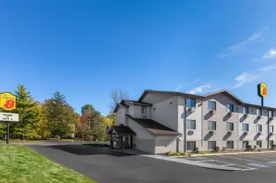 a building on a street next to a road at Super 8 by Wyndham Kent/Akron Area in Kent