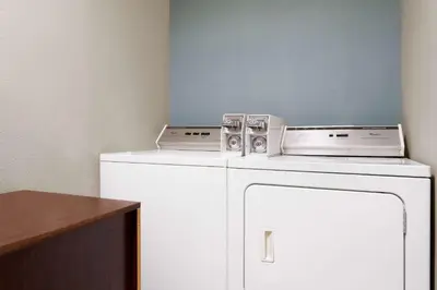 a white washer and dryer in a room at Baymont by Wyndham Boardman in Boardman