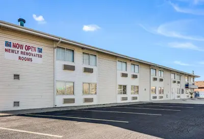 a large white building with a sign on the side at Motel 6-Fort Wayne, IN in Fort Wayne