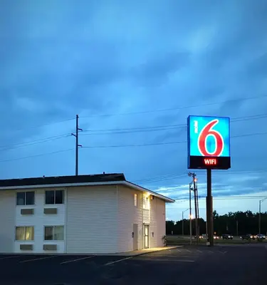 a walmart sign in front of a building at Motel 6-Fort Wayne, IN in Fort Wayne