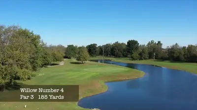 a view of the ninth green on the golf course at Randolph Inn and Suites in Winchester