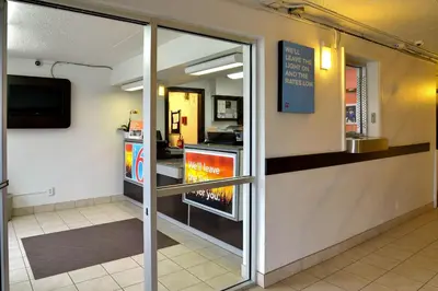 a fast food restaurant with a sliding glass door at Motel 6-Toledo, OH in Maumee