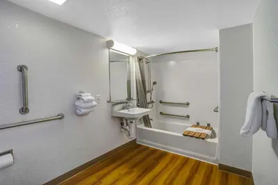 a bathroom with a sink and a shower at Motel 6 Lexington I-75 Hamburg in Lexington