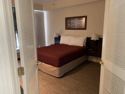 a bedroom with a bed in a room at McCoy's Inn in Ripley