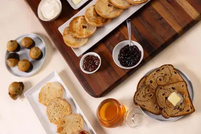 a table topped with plates of pastries and dips at Drury Inn & Suites Cincinnati Northeast Mason in Mason