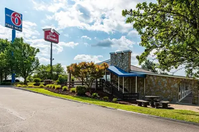 a gas station with a sign in front of it at Motel 6-Mansfield, OH in Mansfield