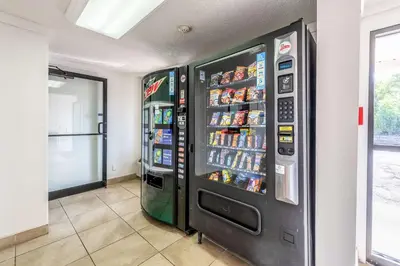 a soda vending machine in a room at Motel 6-Mansfield, OH in Mansfield