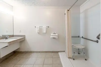a bathroom with a sink and a shower at Motel 6-Mansfield, OH in Mansfield