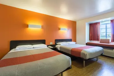 a hotel room with two beds and a window at Motel 6-Huron, OH - Sandusky in Huron