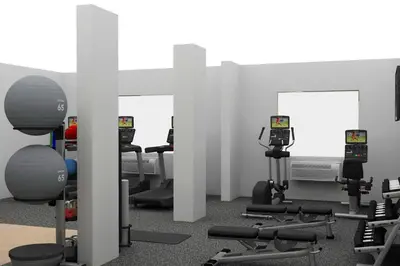 a gym with several treadmills and exercise machines at Fairfield by Marriott Inn & Suites Georgetown Lexington in Georgetown