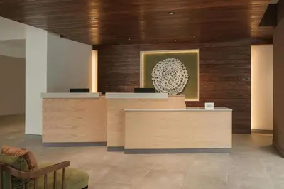 a lobby with a reception desk in a building at Fairfield by Marriott Inn & Suites Georgetown Lexington in Georgetown