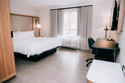 a hotel room with a bed and a desk at Fairfield by Marriott Inn & Suites Georgetown Lexington in Georgetown