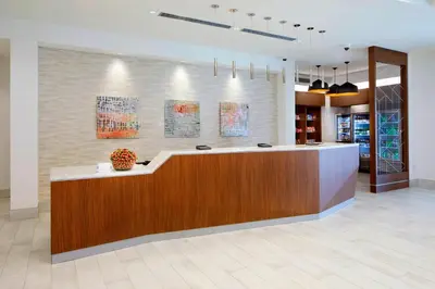 a lobby with a reception desk in a building at SpringHill Suites by Marriott Columbus Easton Area in Columbus