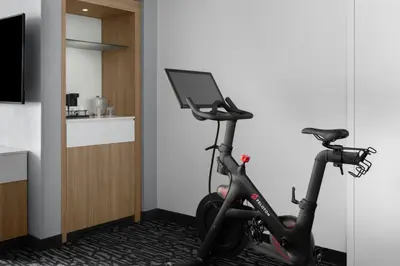 a room with a bike with a laptop on it at TownePlace Suites by Marriott Columbus Easton Area in Columbus