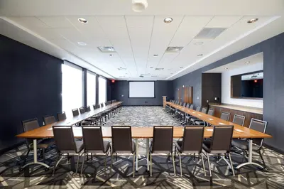 a conference room with a long table and chairs at TownePlace Suites by Marriott Columbus Easton Area in Columbus