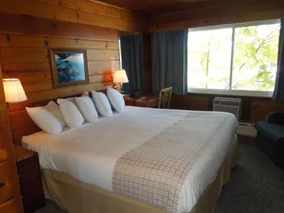 a bedroom with a large bed in a cabin at Arlington Inn in Port Clinton