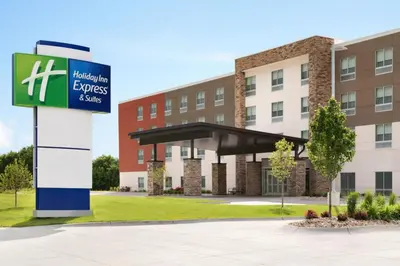 a sign in front of a building at Holiday Inn Express & Suites - Millersburg by IHG in Millersburg
