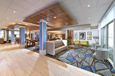 a rendering of a lobby with chairs and tables at Holiday Inn Express & Suites - Millersburg by IHG in Millersburg