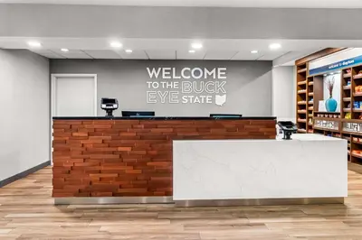 a welcome to the buck eye state sign in a store lobby at Hampton Inn by Hilton Dayton South in Miamisburg