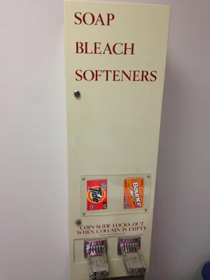 a sign for a soap beach softeners is on a mirror at Super 8 by Wyndham Gas City Marion Area in Gas City