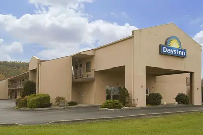 a day inn sign on the front of a building at Days Inn by Wyndham Morehead in Morehead
