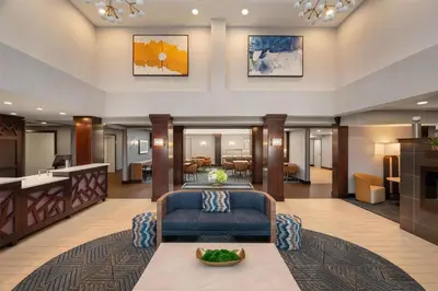 a living room with a couch and a table at Homewood Suites by Hilton Columbus/Polaris in Columbus