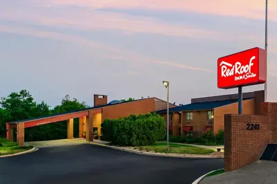 a rendering of a redford motel sign in a parking lot at Red Roof Inn & Suites Lexington - Hamburg in Lexington